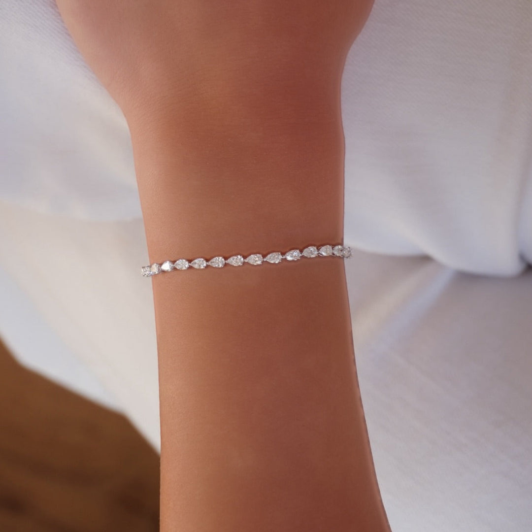14KW 3.88 CTW Lab Grown Pear-Cut Diamond Line Bracelet On Model-Embark Fine Jewelry