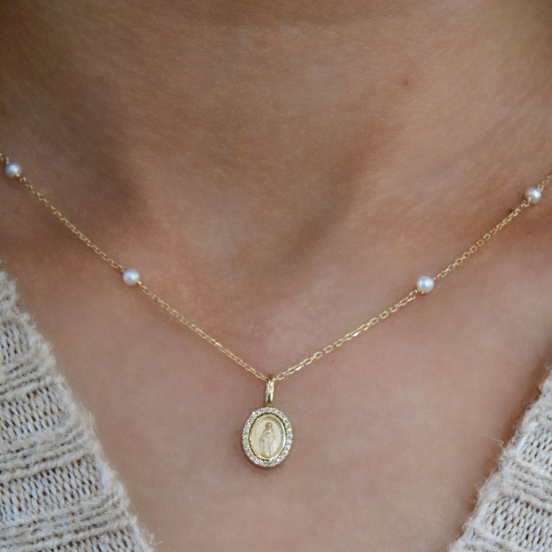 14KY .05 CTW Diamond &amp; Pearl Station Miraculous Medal Necklace On Model-Embark Fine Jewelry