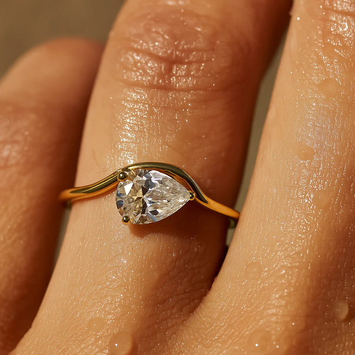 Offset Pear Solitaire Ring