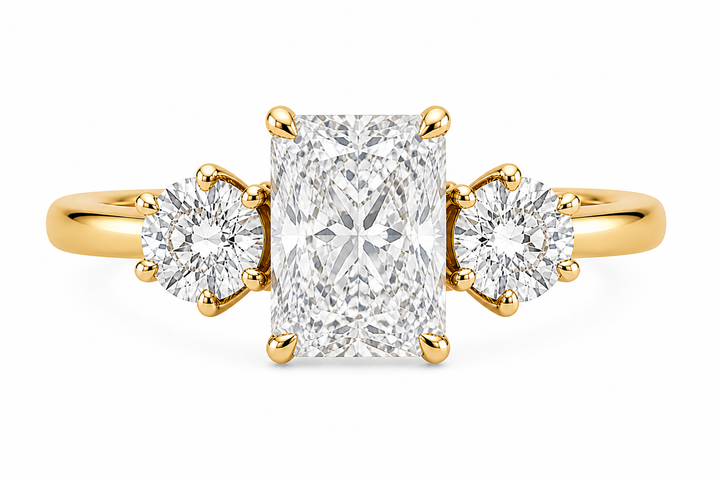 Adelaide Signature 14K yellow gold engagement ring with a radiant center diamond and round side stones.