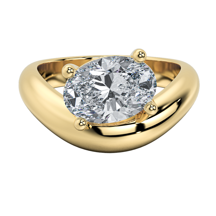 Caroline engagement ring: gold band with an off-set pear-shape diamond center, classic modern design.