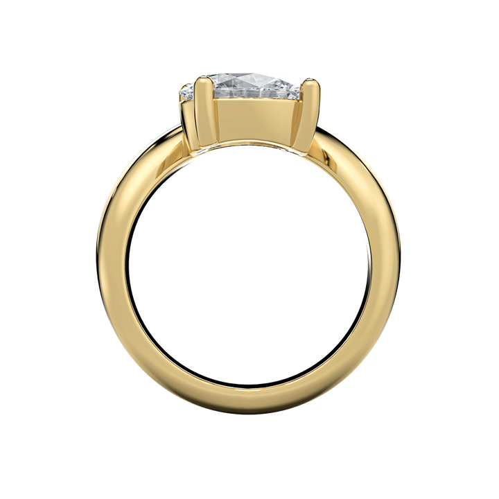 Gold engagement ring with an off-set pear-shape diamond center.