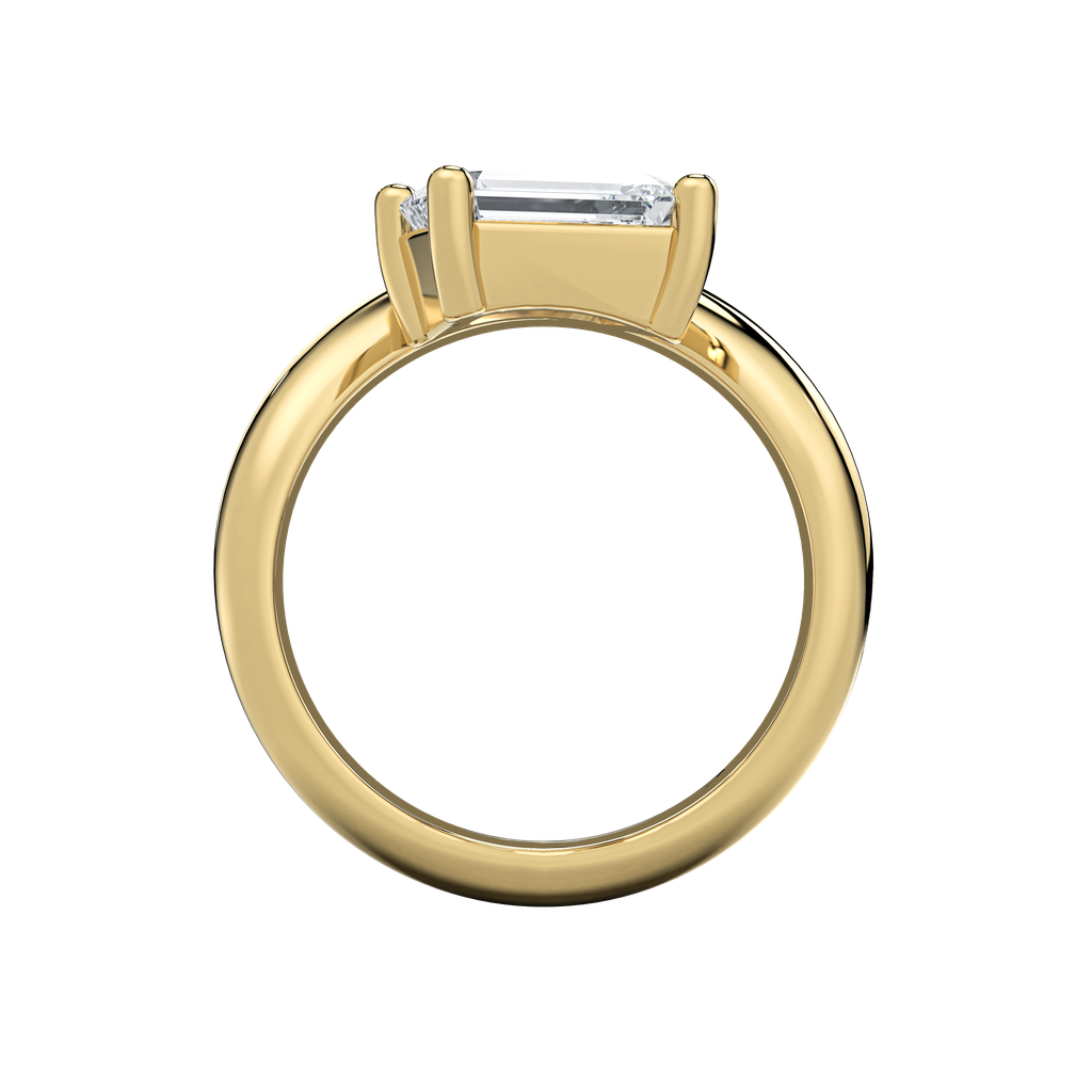 Caroline engagement ring: gold band with an off-set pear-shape diamond center.