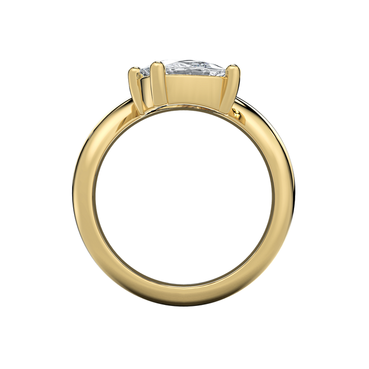 Caroline engagement ring: gold band with an off-set pear-shape diamond center.