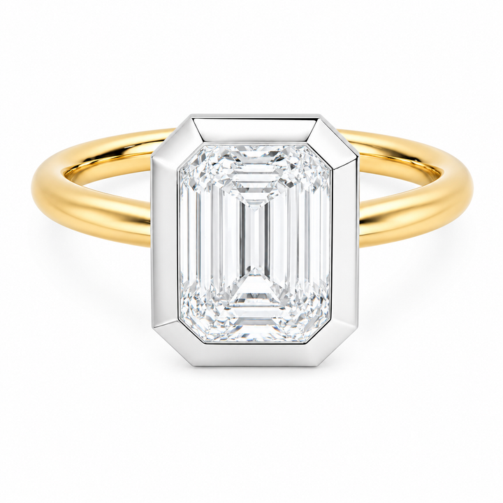 Celeste 14K yellow and white gold engagement ring with emerald cut diamond in a two-tone bezel.