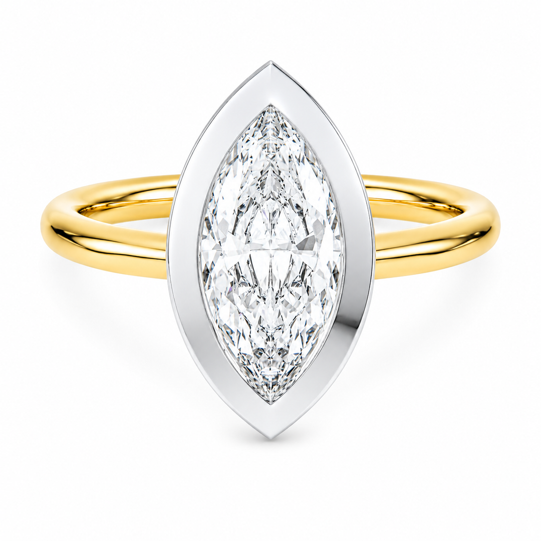Celeste two-tone 14K yellow and white gold engagement ring with a marquise diamond.