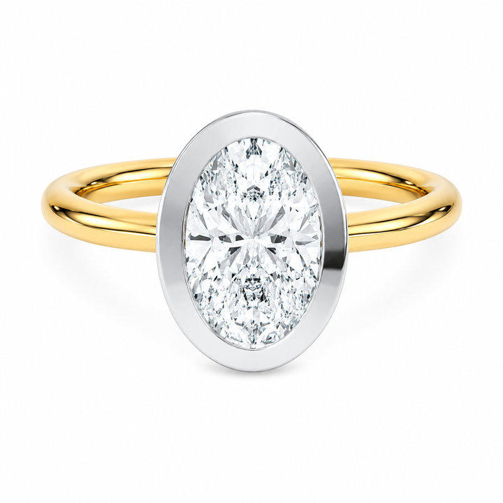 Celeste 14K yellow and white gold engagement ring with oval diamond in two-tone bezel.