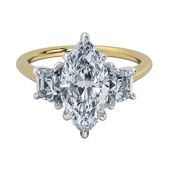 Charlotte engagement ring with marquise center diamond, trapezoid side stones, and gold band.