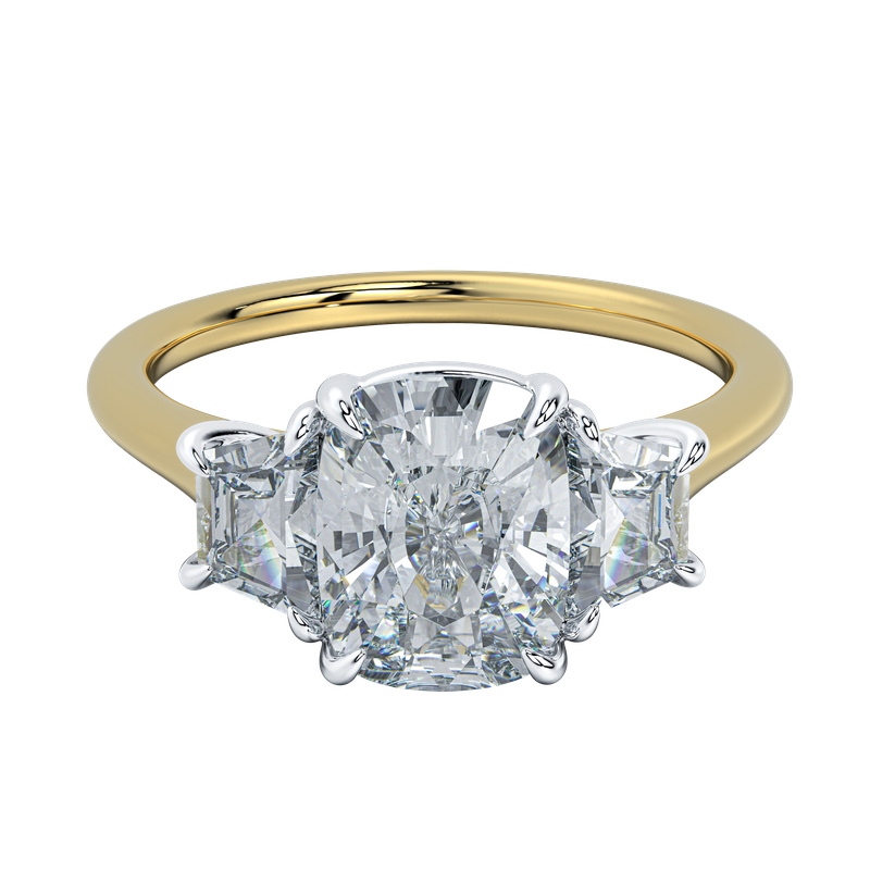 Charlotte engagement ring with a cushion-cut diamond center and trapezoid side stones on a yellow gold band.