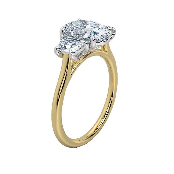 Charlotte three-stone engagement ring with a 2 CT diamond, trapezoid side stones, and a 14K yellow and white gold setting.