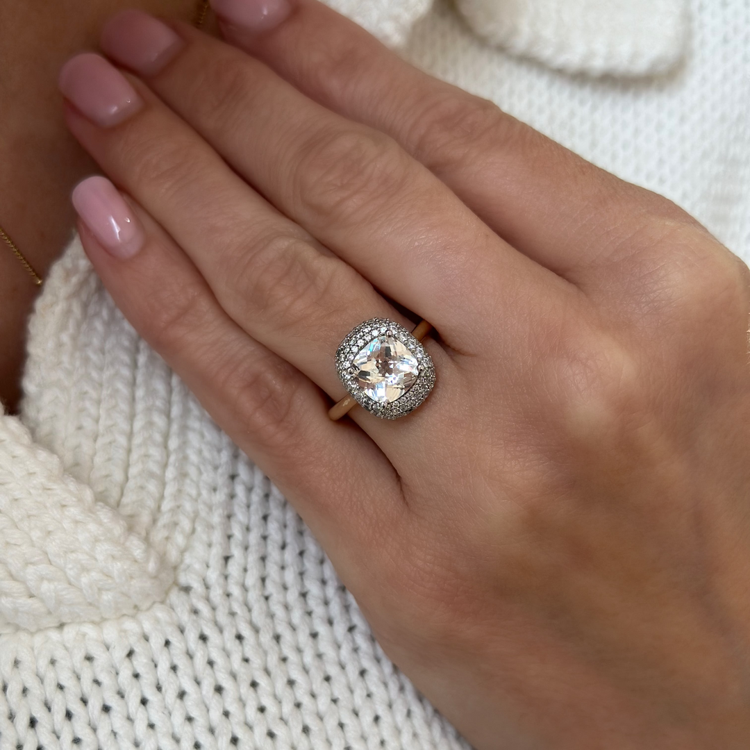 Eleanor UNBRIDALED engagement ring: sparkling cushion-cut center, pavé halo, yellow gold band.