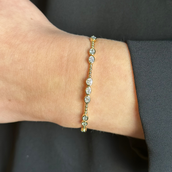 14K Oval Bezel Diamond Flex Bangle
