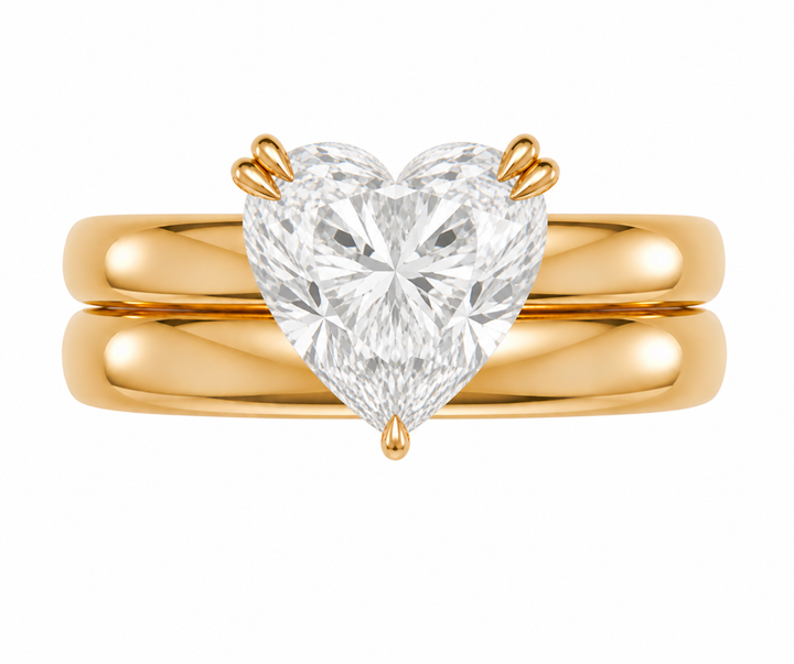 Frankie Signature engagement ring with a heart-shaped diamond on a 14K yellow gold double dome band.