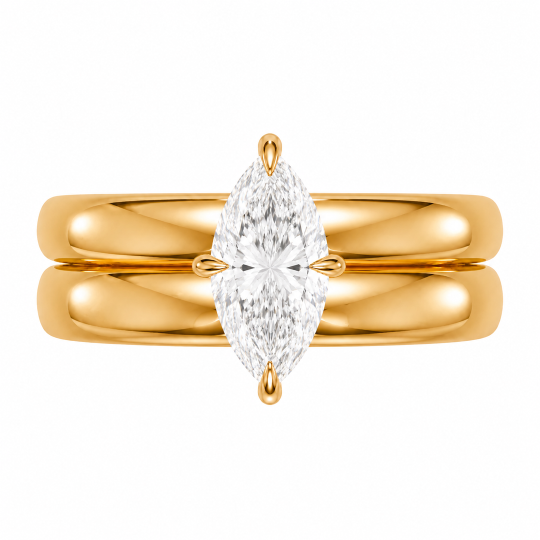 Frankie Signature engagement ring with a marquise diamond on a 14K yellow gold double dome band.