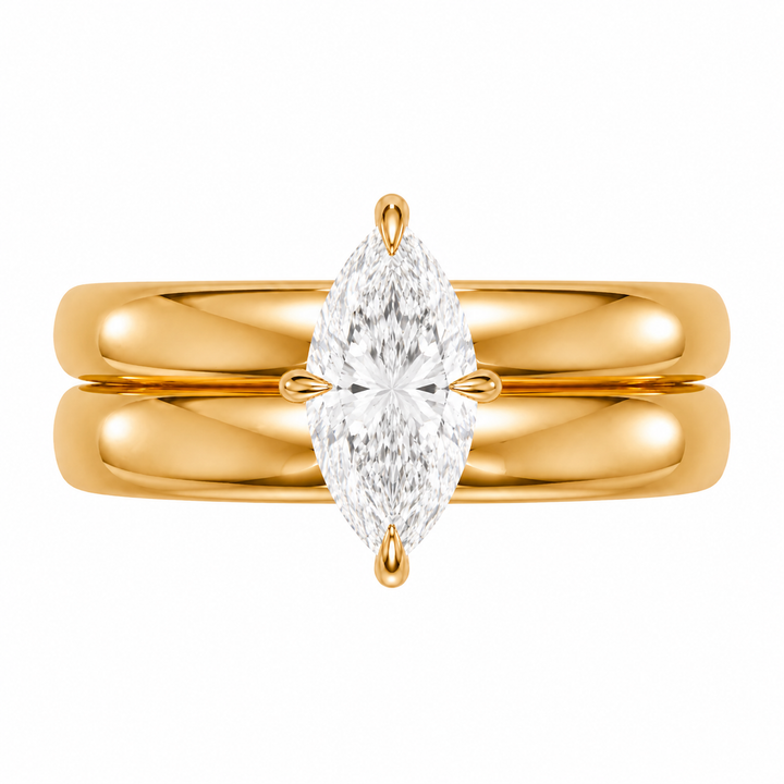 Frankie Signature engagement ring with a marquise diamond on a 14K yellow gold double dome band.