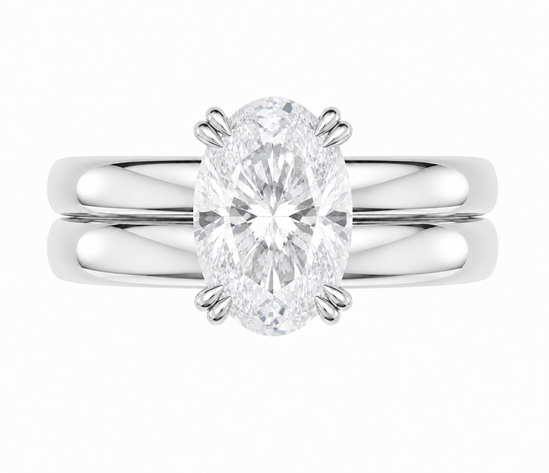 Frankie Signature engagement ring with an oval diamond on a double dome 14K white gold band.