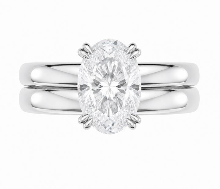 Frankie Signature engagement ring with an oval diamond on a double dome 14K white gold band.