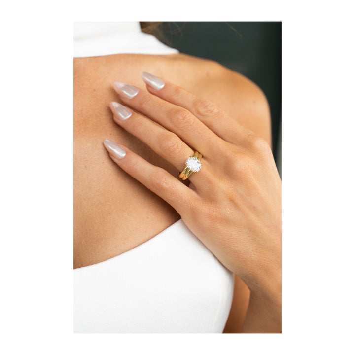Frankie Signature engagement ring: 14K yellow gold double dome band with a 2 CT solitaire diamond.