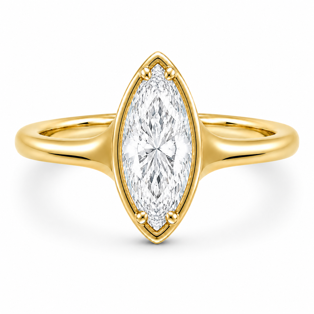 Goldie Signature 14K yellow gold engagement ring with a marquise diamond.
