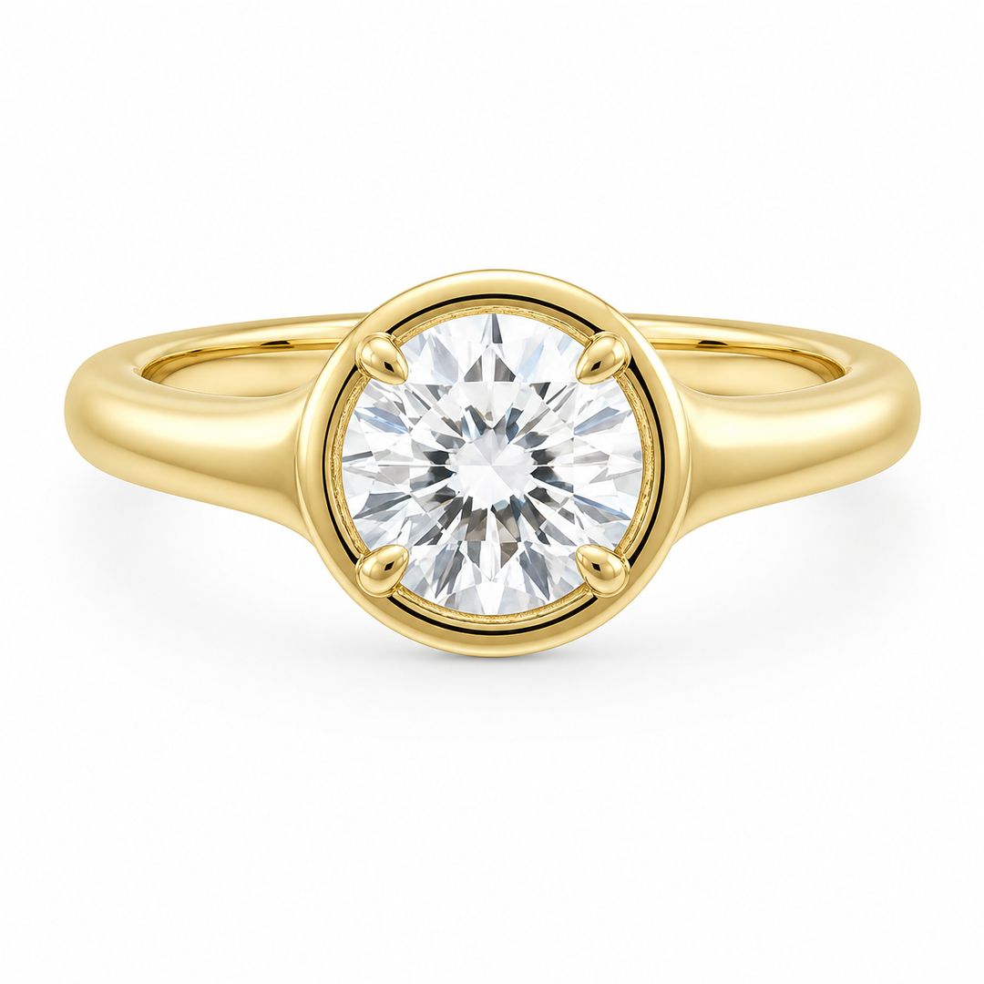 Goldie Signature 14K yellow gold engagement ring with a round diamond in a dome-like bezel setting.