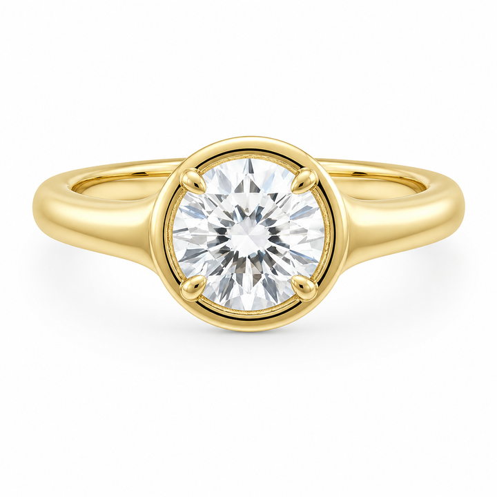 Goldie Signature 14K yellow gold engagement ring with a round diamond in a dome-like bezel setting.