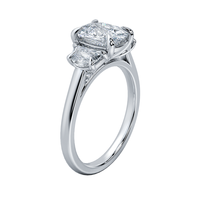 Hailey engagement ring: oval-cut diamond center stone with two side diamonds on a delicate gold band.