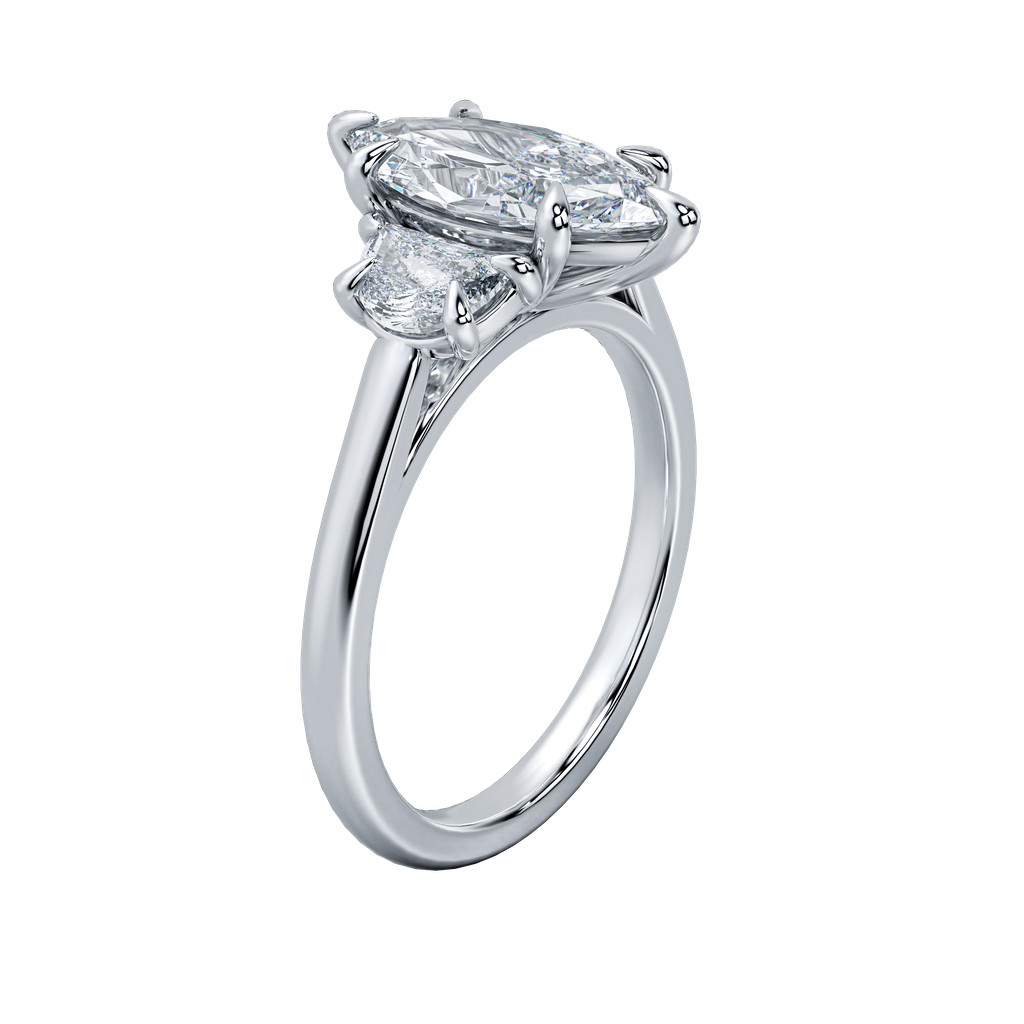 Hailey engagement ring with an oval-cut center diamond and two smaller side diamonds on a delicate gold band.