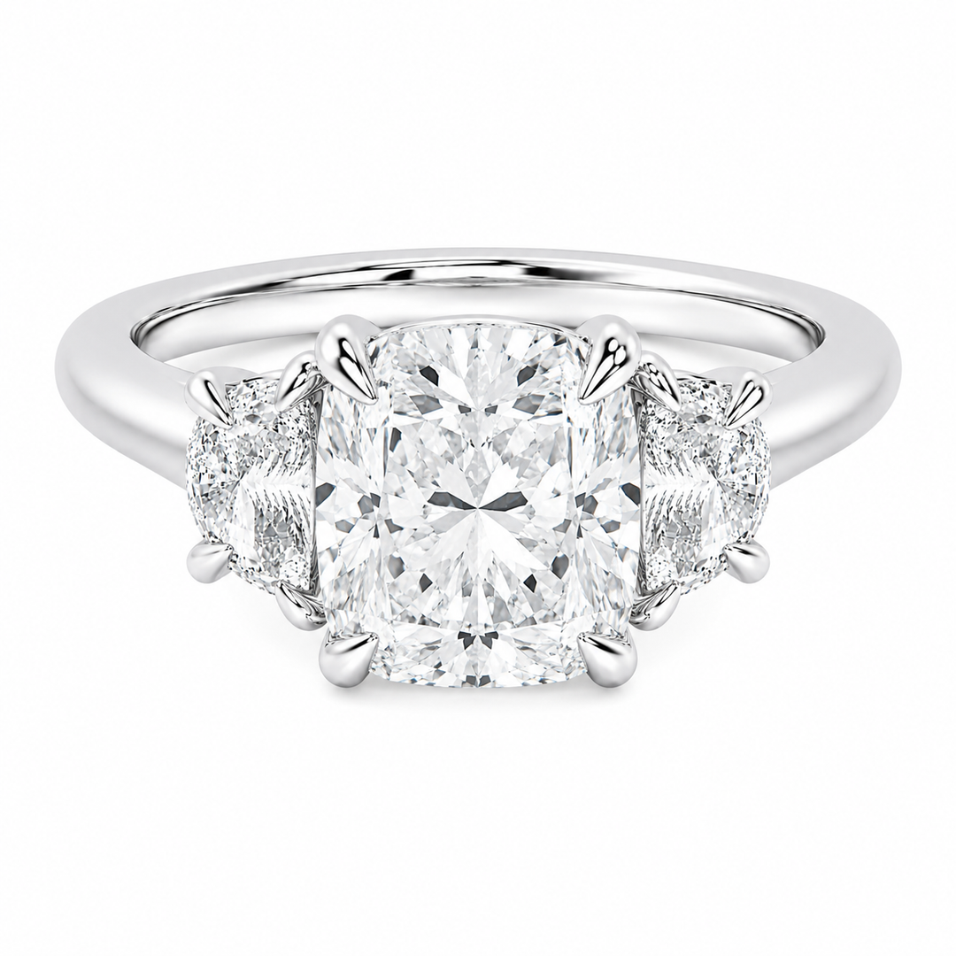 Hailey Signature 14K white gold engagement ring with a cushion-cut center diamond and half-moon side stones.