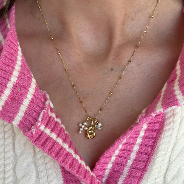 Shell Pearl Cross Charm