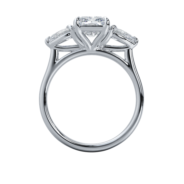 Silver three-stone engagement ring with a radiant cut center diamond and two pear-shaped side stones.