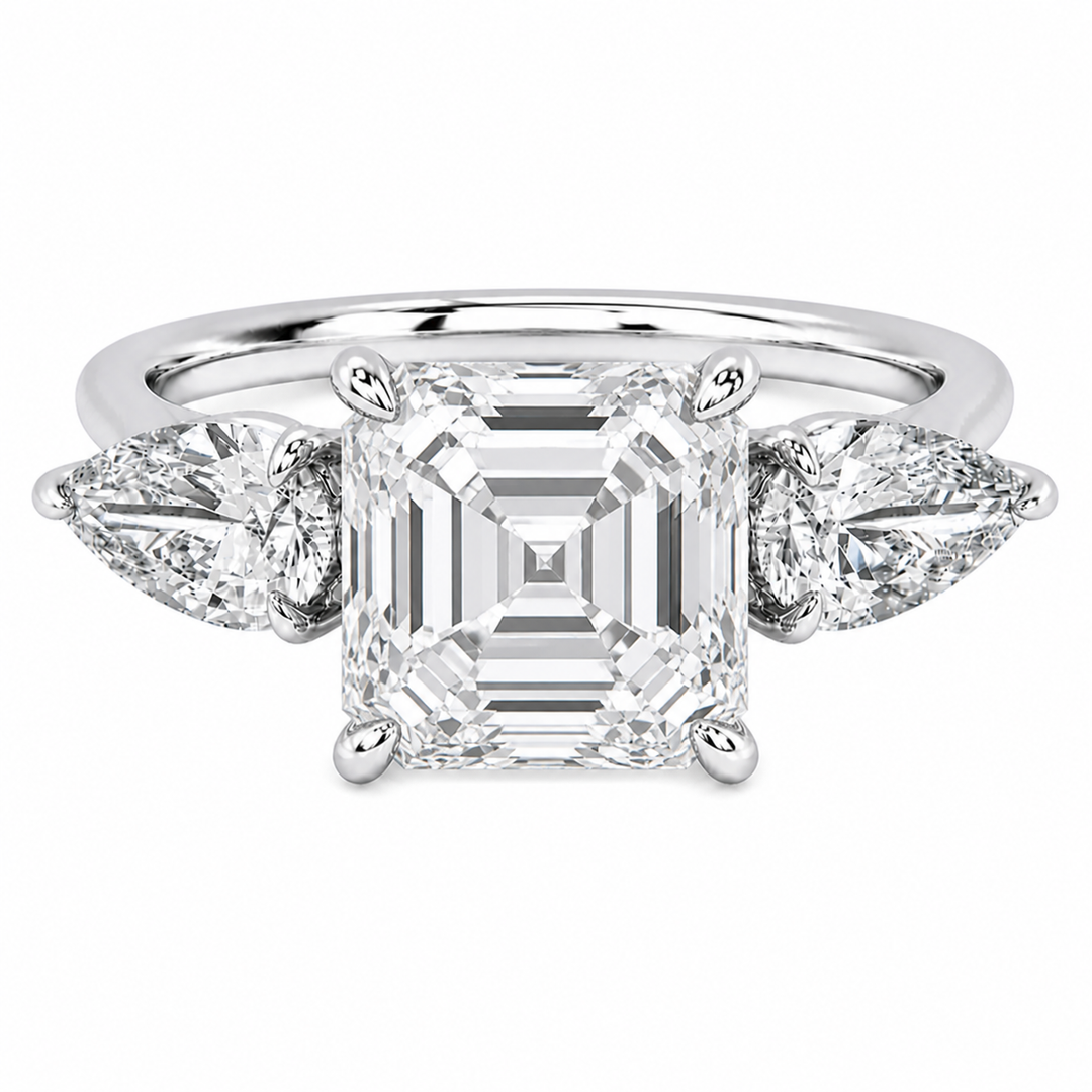 14K white gold Ivy Signature engagement ring with an Asscher cut center diamond and pear side stones.