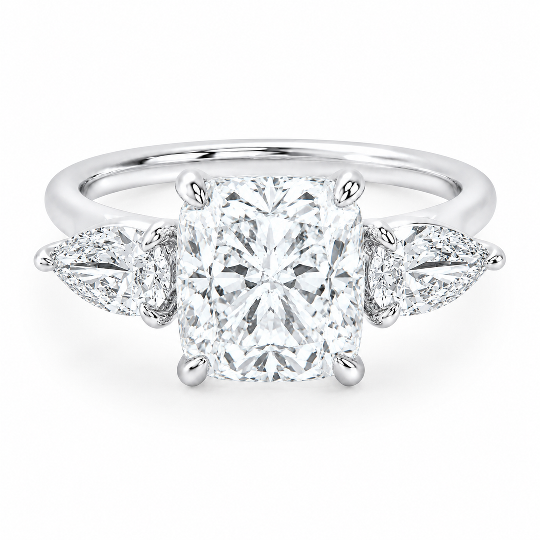 Ivy Signature 14K white gold engagement ring with a cushion-cut center diamond and pear side stones.