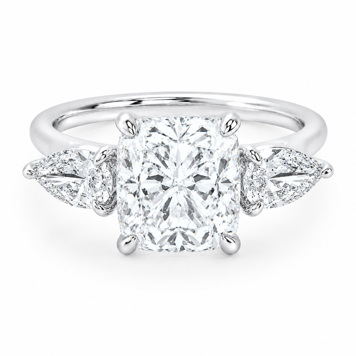 Ivy Signature 14K white gold engagement ring with a cushion-cut center diamond and pear side stones.