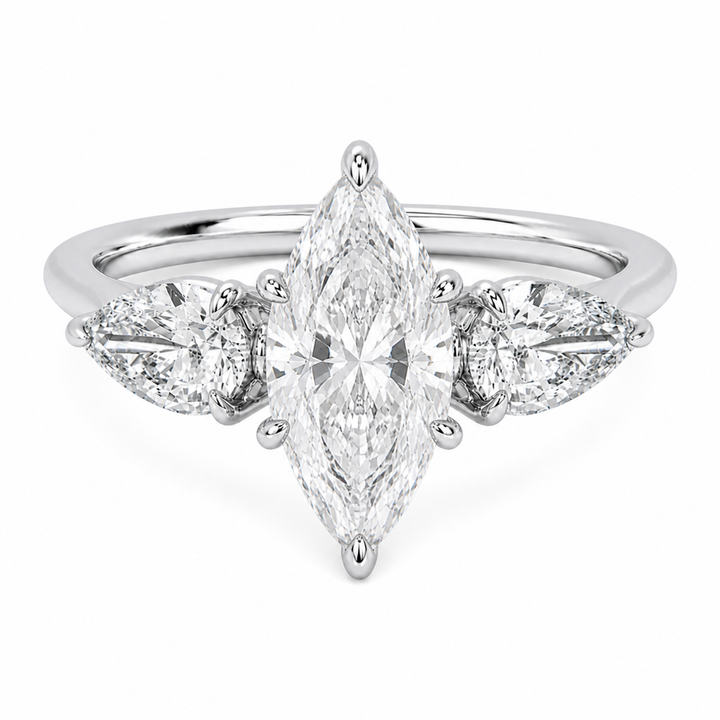 Ivy Signature engagement ring with a marquise center diamond and two pear side stones in 14K white gold.
