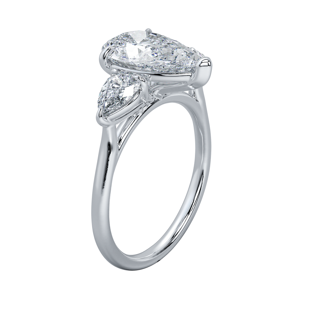 14K white gold Ivy Signature Engagement ring with a large pear-shaped center diamond and two smaller pear side stones.