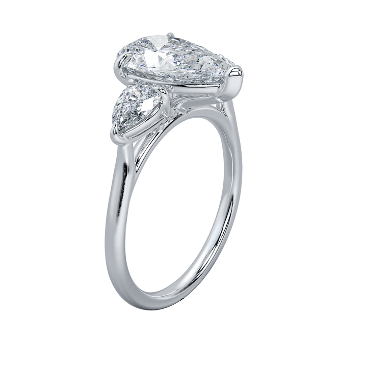 14K white gold Ivy Signature Engagement ring with a large pear-shaped center diamond and two smaller pear side stones.