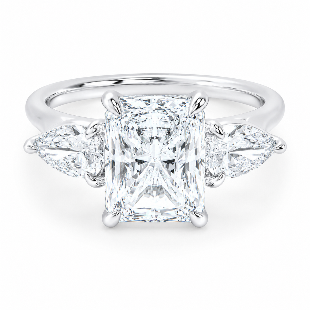 14K white gold Ivy Signature engagement ring with a radiant center diamond and pear side stones.