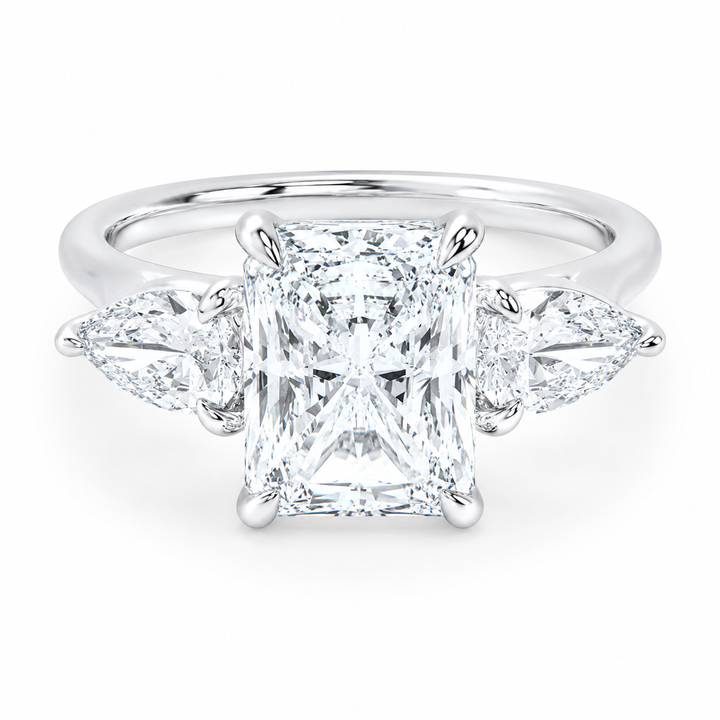 14K white gold Ivy Signature engagement ring with a radiant center diamond and pear side stones.