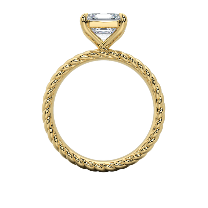 Jenn engagement ring: gold rope band with an emerald-cut diamond.