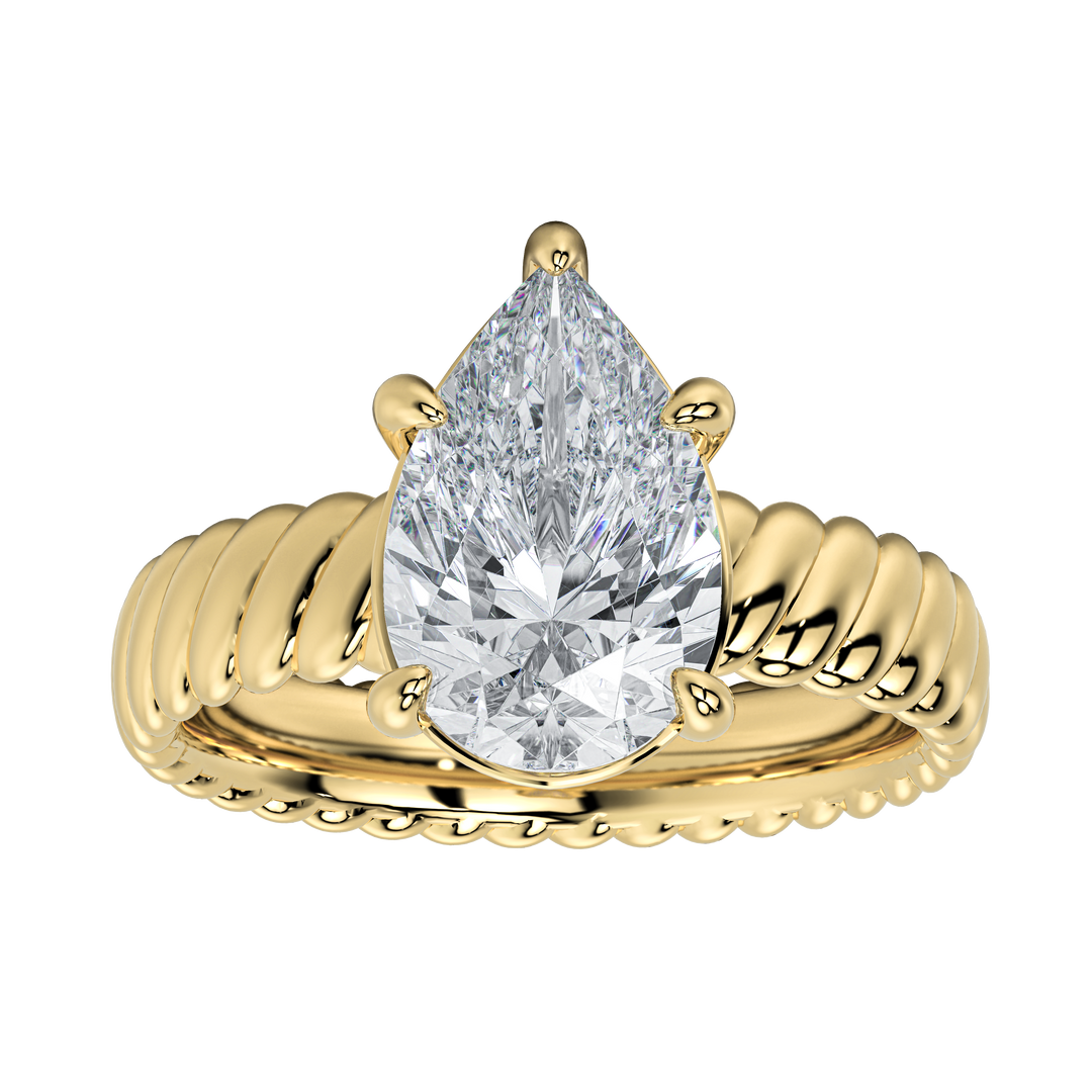 Jenn engagement ring with a pear-cut diamond center stone and a unique gold rope band.