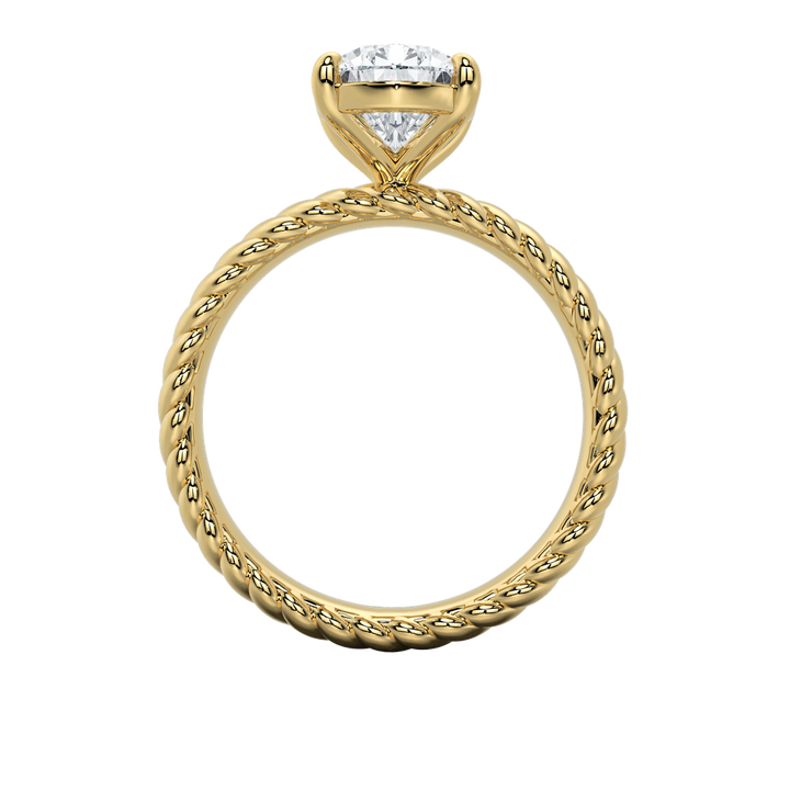 Jenn engagement ring: gold rope band with a sparkling emerald-cut diamond.