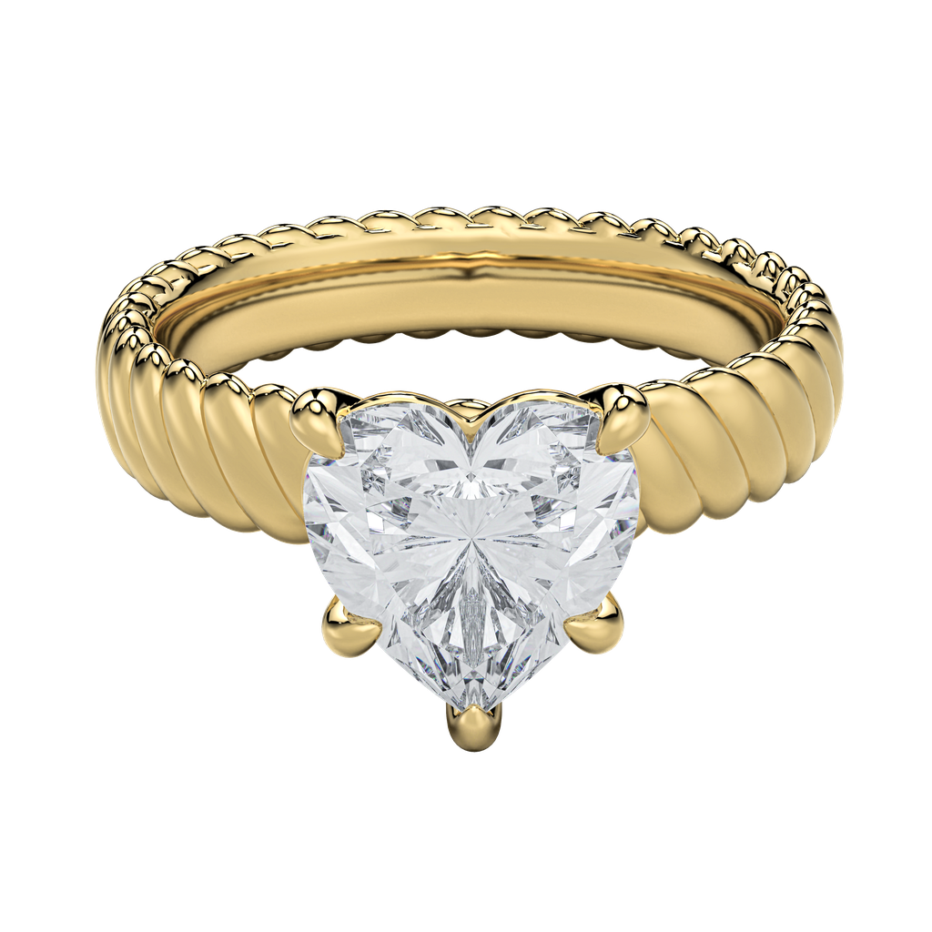 Jenn engagement ring: gold rope band with a heart-shaped diamond.