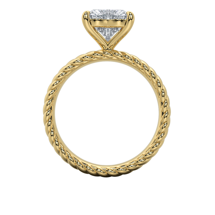 Jenn engagement ring with an emerald-cut diamond and intricate gold rope band.