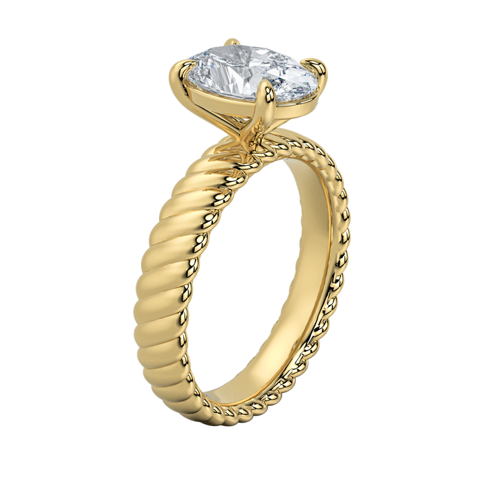 Jenn engagement ring with an emerald-cut diamond and a unique gold rope band.