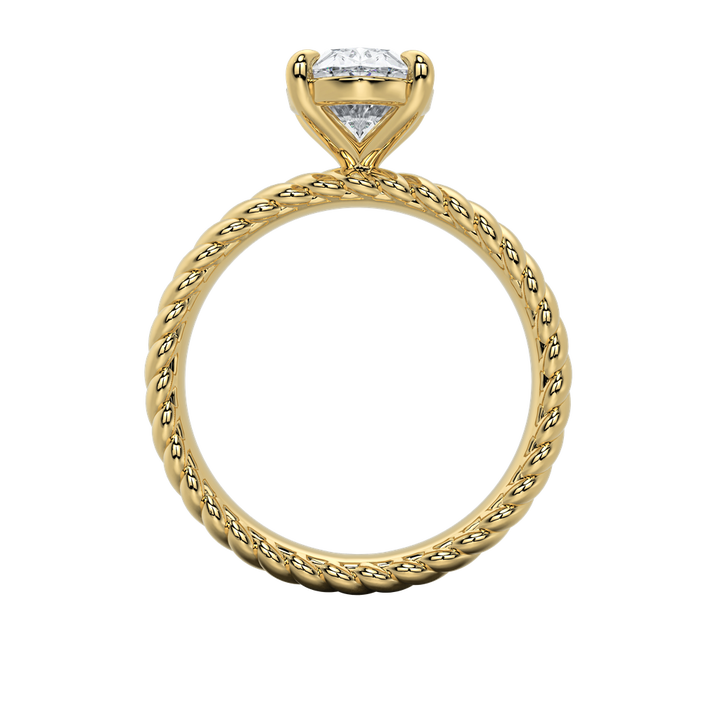 Jenn engagement ring: gold rope band with a sparkling emerald-cut diamond.