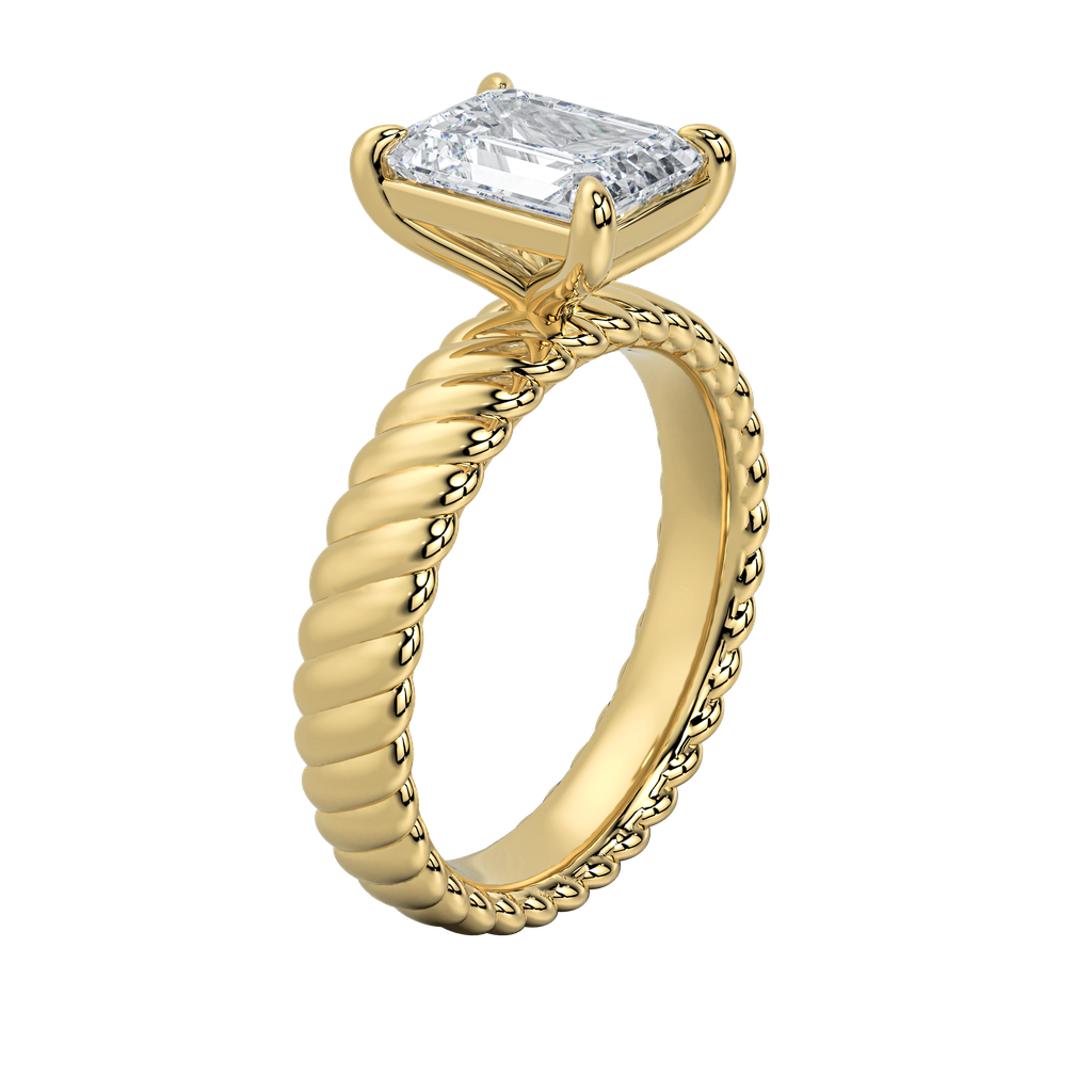 Jenn engagement ring: gold band with intricate rope design and emerald-cut diamond.