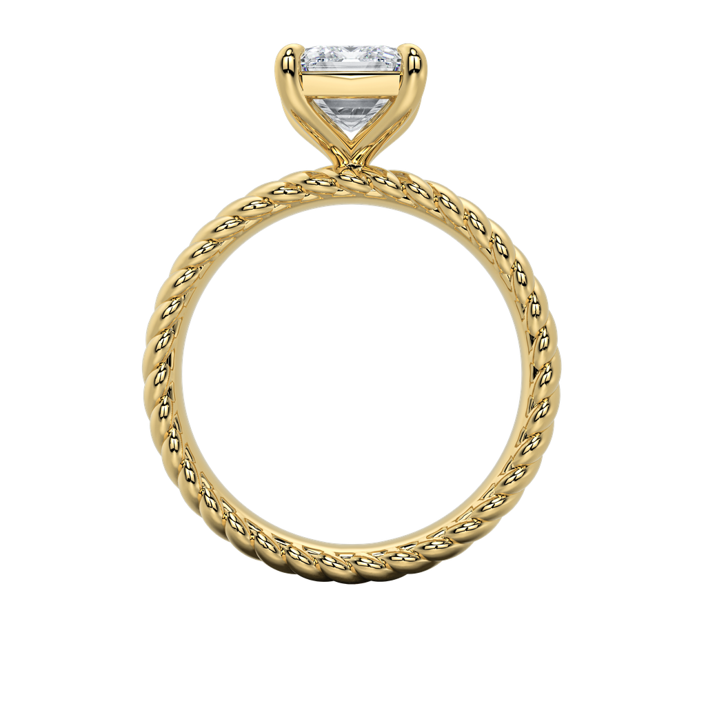Gold engagement ring with an emerald-cut diamond and intricate rope band.