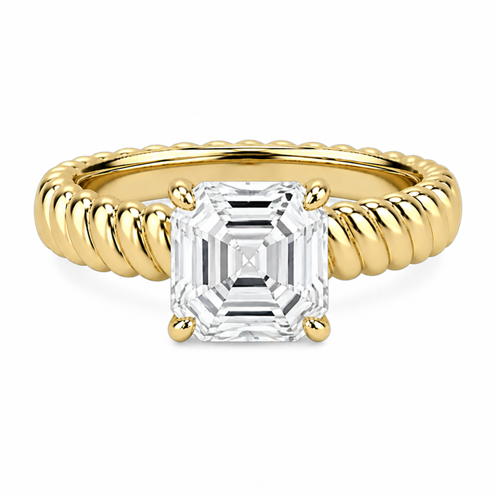 Jenn Signature engagement ring with an Asscher cut diamond on a 14K yellow gold rope band.