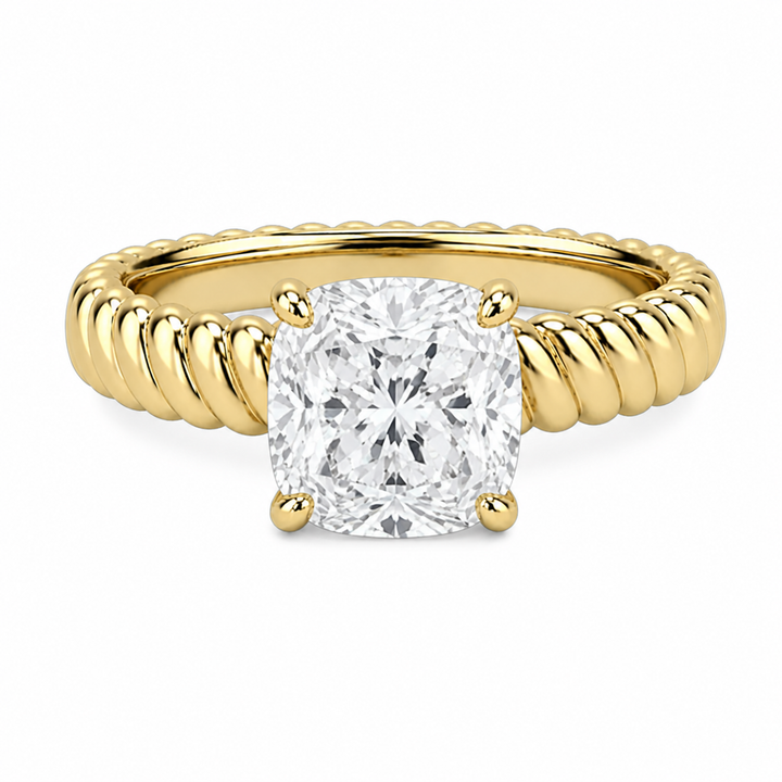 Jenn Signature engagement ring: 14K yellow gold rope band with a cushion-cut solitaire diamond.