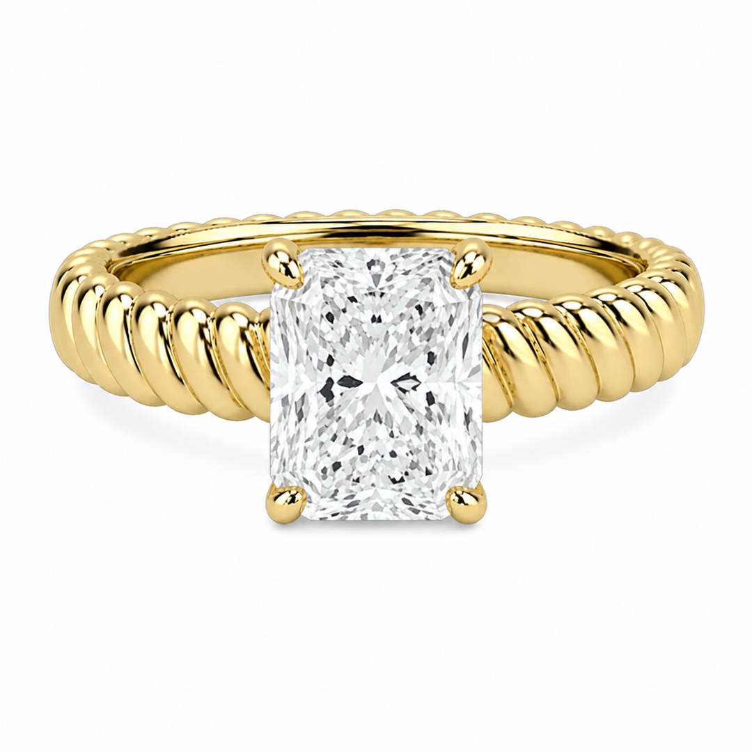 Jenn Signature engagement ring with a radiant diamond center on a 14K yellow gold rope band.